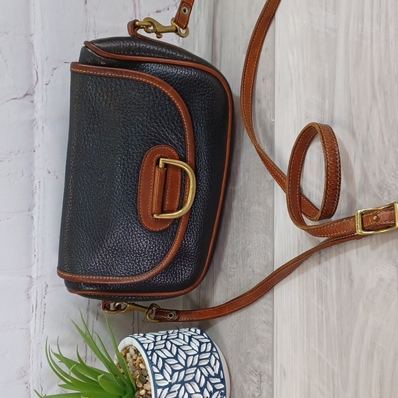 Dooney & Bourke Handbags - Dooney & Bourke Horseshoe Porthole Clutch- Pre-tag vintage